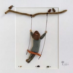 Cuadro con piedras Niña en el columpio