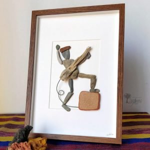 Cuadro con piedras El bajista
