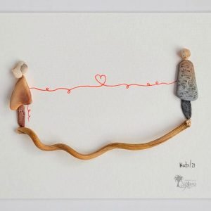 Cuadro con piedras El hilo rojo