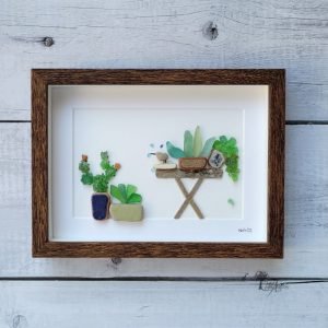 Decoración del hogar cuadro con piedras la hora del baño hecho a mano en Barcelona cristales del mar reciclaje creativo UdanasArt